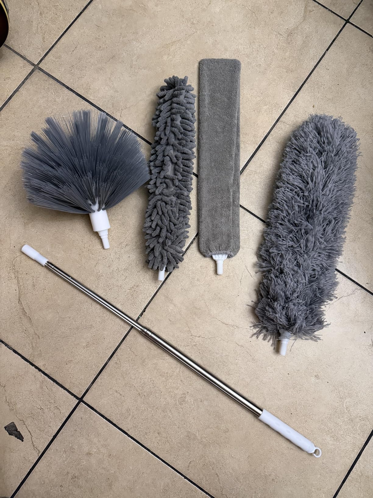 3. Reach Cobwebs and Ceiling Fans Without a Stepstool Using a 5-in-1 Duster Kit