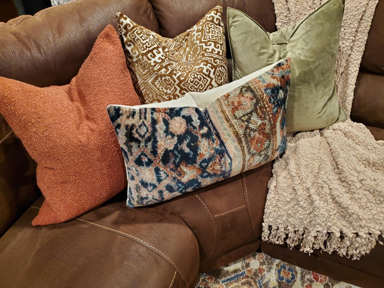11. Introduce Tactile Depth to Sofas with Cozy BouclΓ© and Tufted Pillows