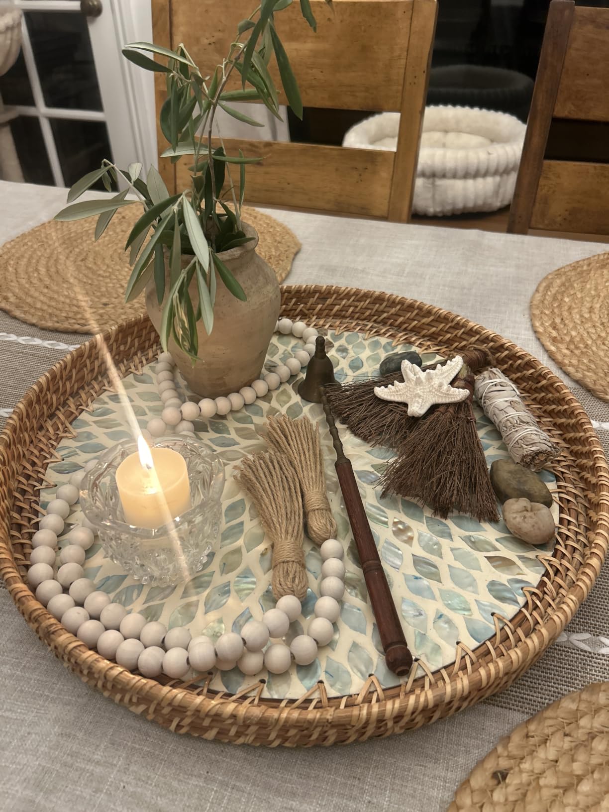 14. Style Coffee Table Books Effortlessly with a Natural Wood Bead Garland