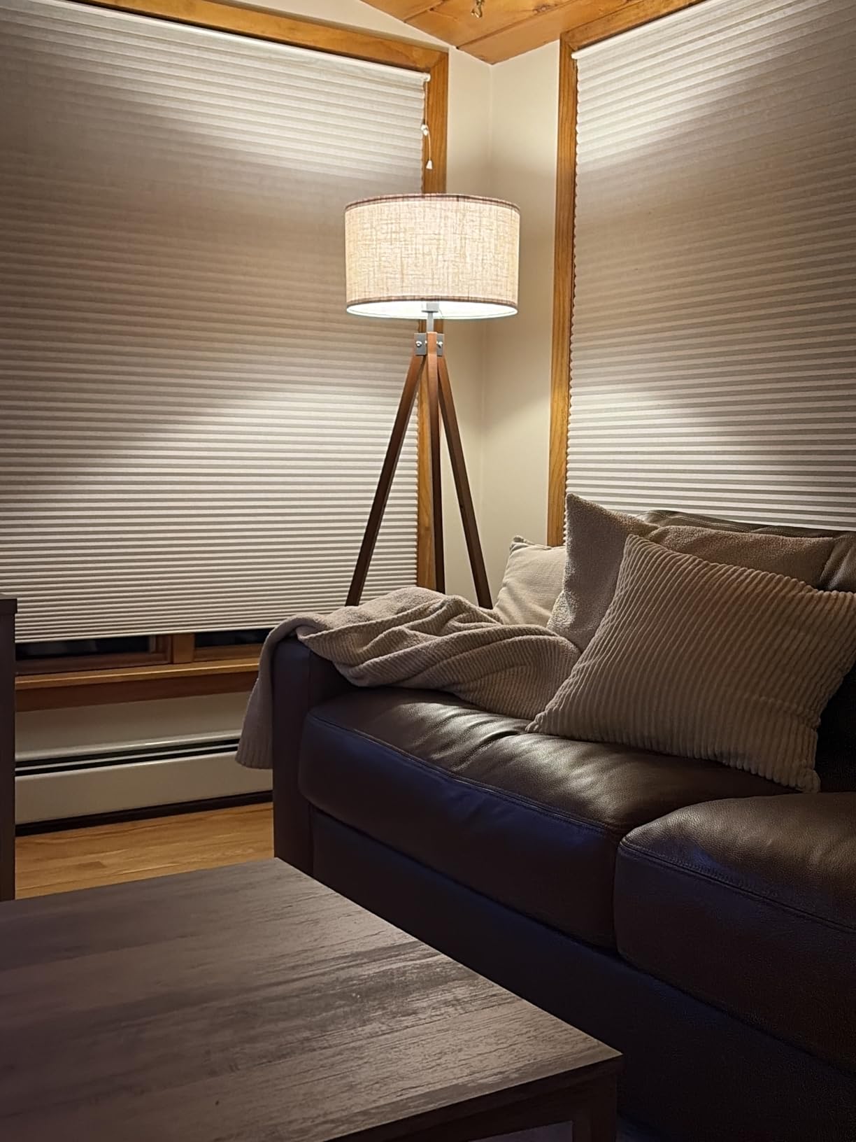 9. Fill Awkward Room Corners with Architectural Warmth via a Tripod Floor Lamp