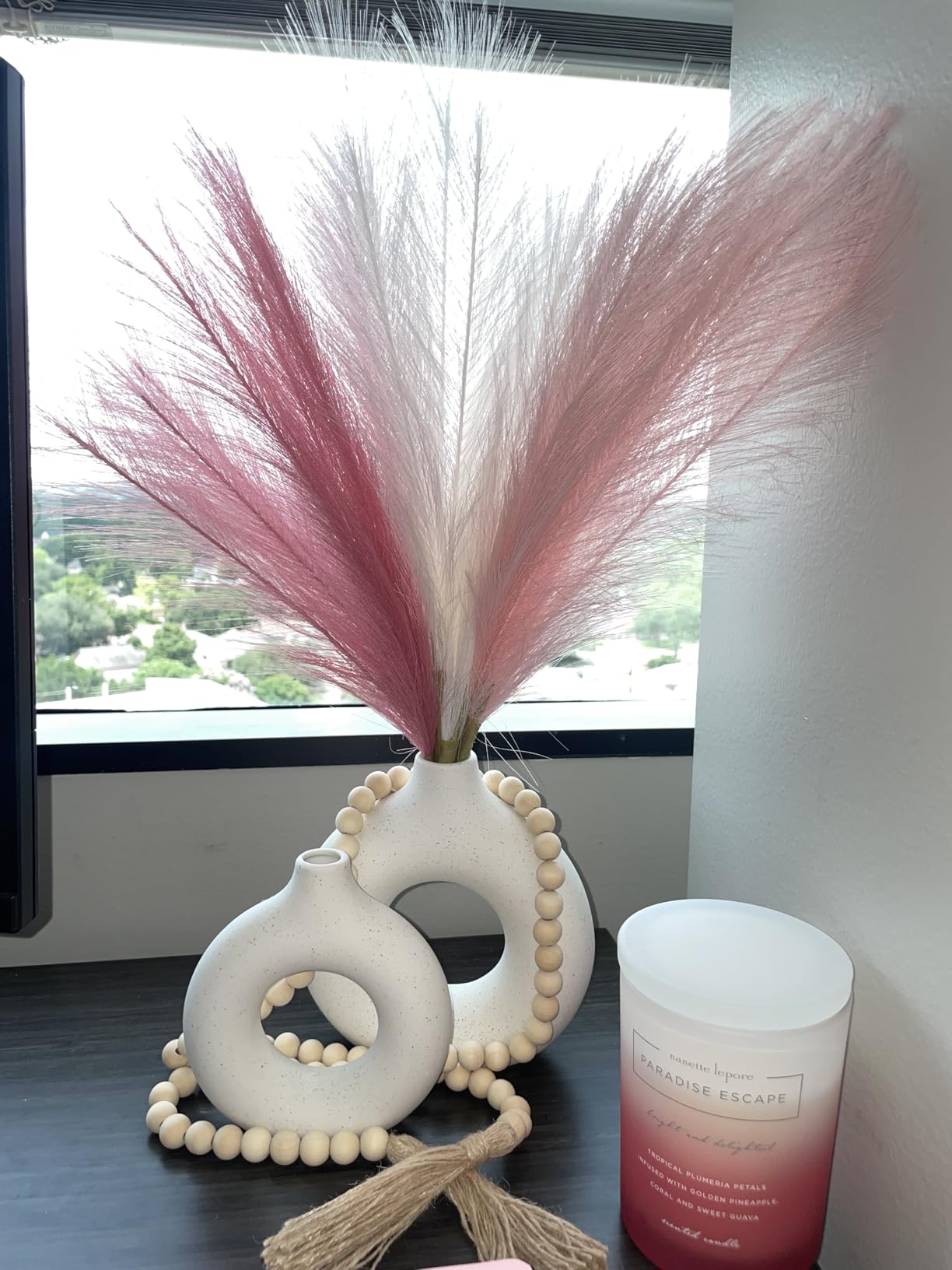 10. Accent Pampas Grass Stems with a Minimalist Nordic Matte White Donut Vase