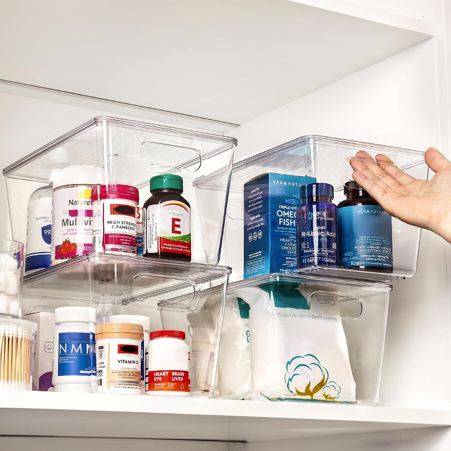 clear stackable storage bins in a cabinet