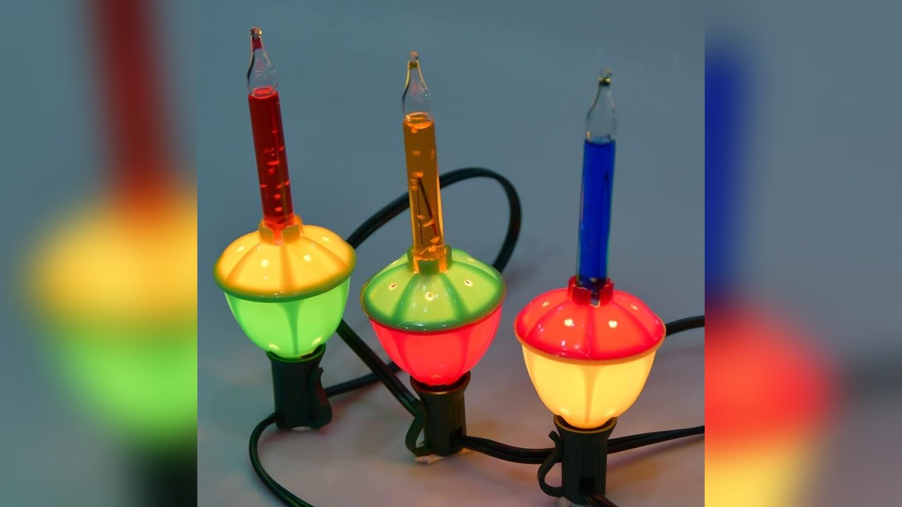 Red orange and blue vintage bubble lights on a green cord, 90s christmas tree