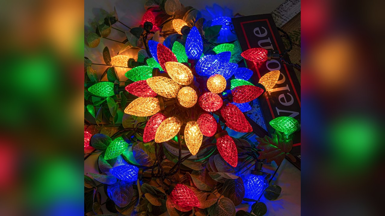 Multicolor C9 bulb string lights glowing red blue and green, 90s christmas tree
