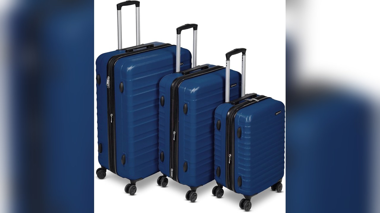 Amazon Basics navy hardside luggage set in three sizes