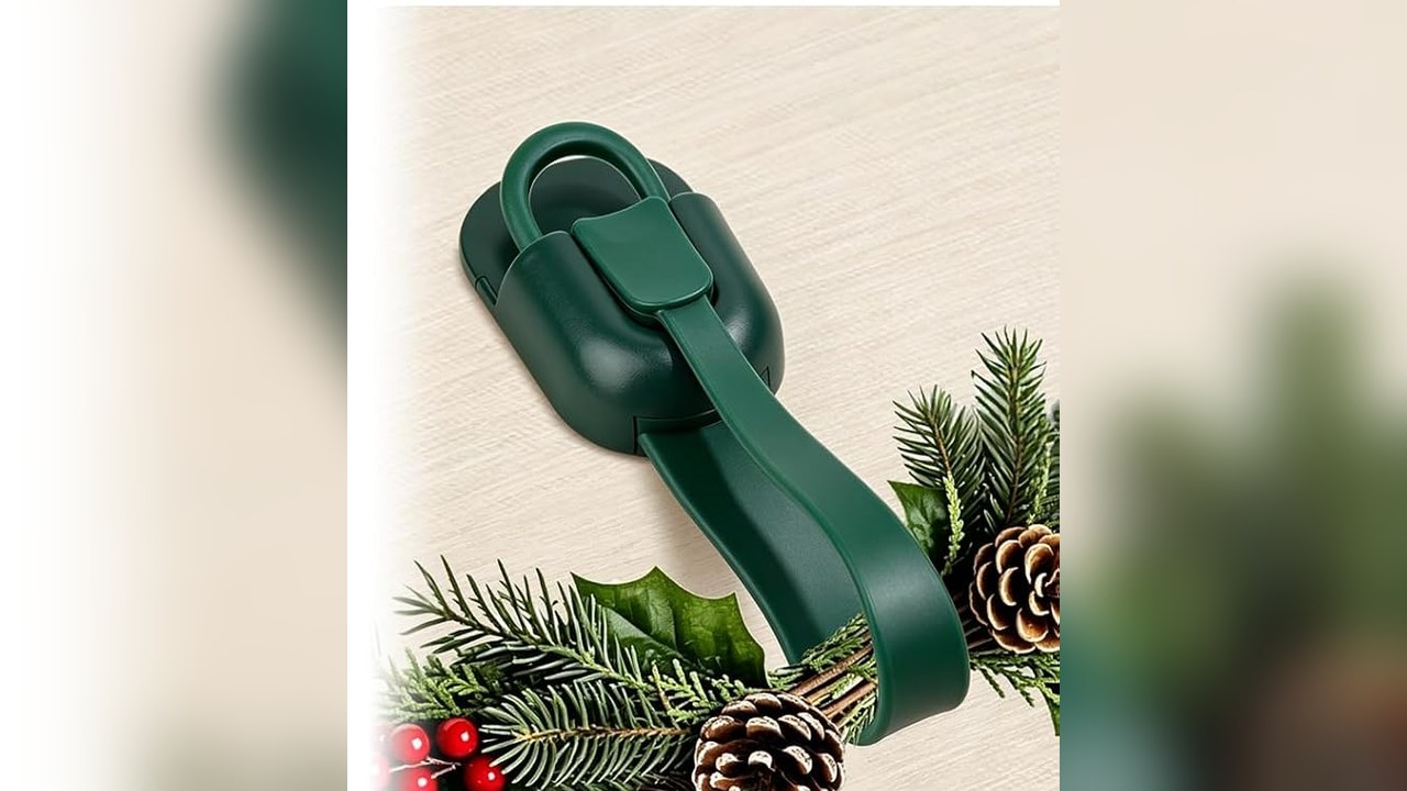 Green silicone garland hangers holding garland on a mantel wall