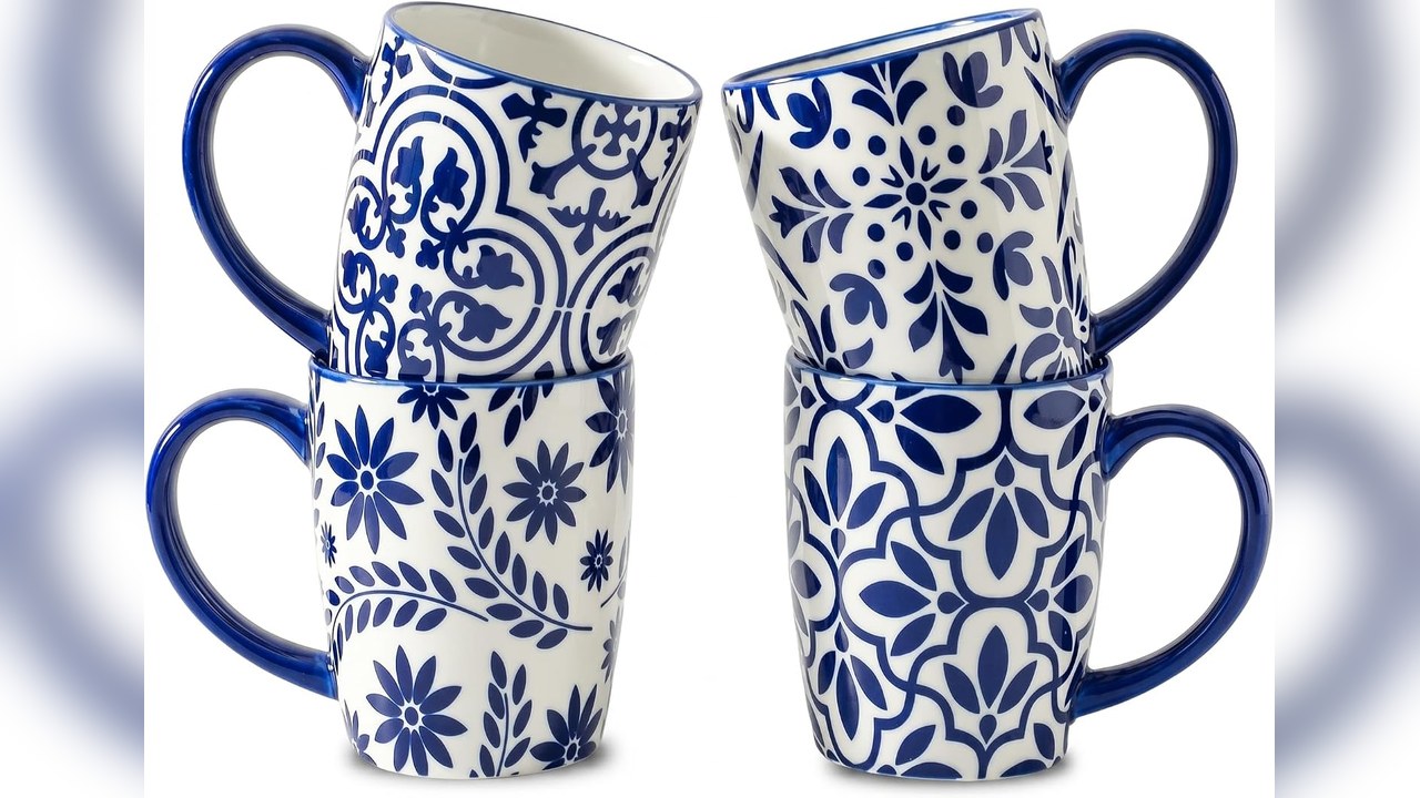 Blue and white floral mugs set on a kitchen shelf