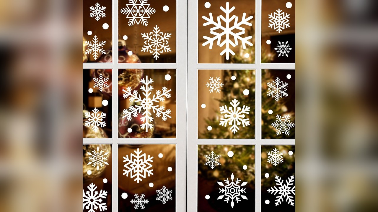 reusable snowflake window clings on a kitchen window