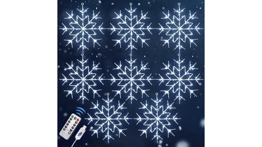 Warm white snowflake window lights hanging at different heights