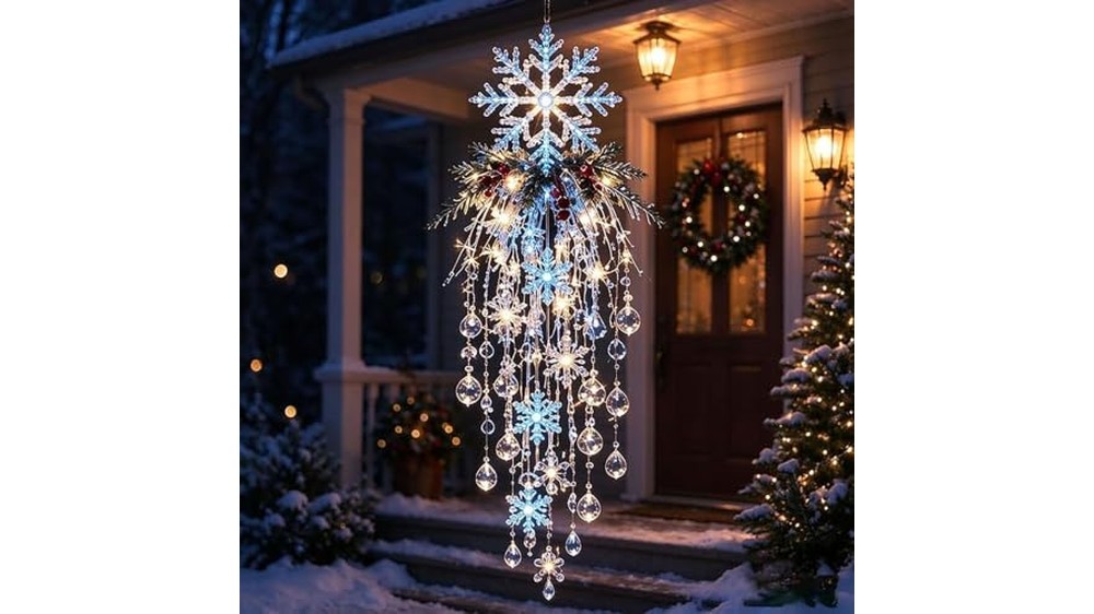 Snowman hanging light with snowflake and icicle drops in a narrow window