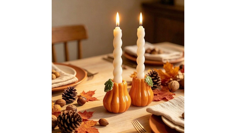 set of 2 ceramic pumpkin taper candle holders in orange
