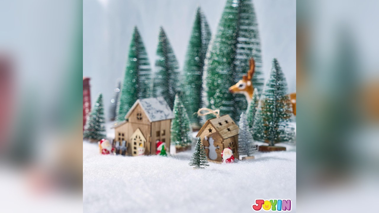 White faux snow blanket spread on a desk shelf under small decor