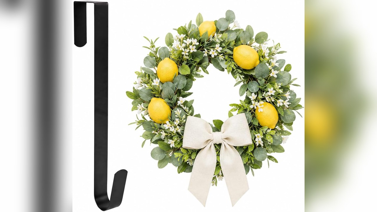 Slim over the door wreath hanger holding a wreath